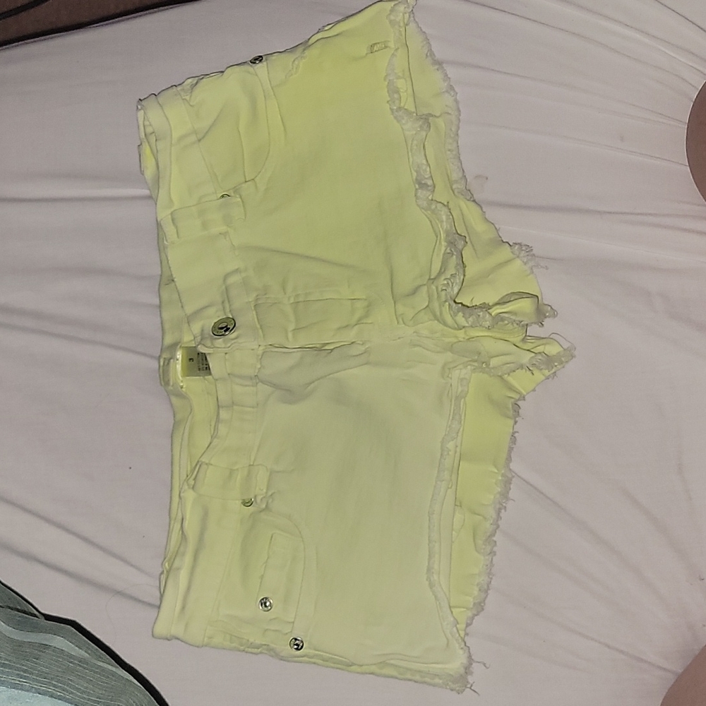 Bright yellow short shorts